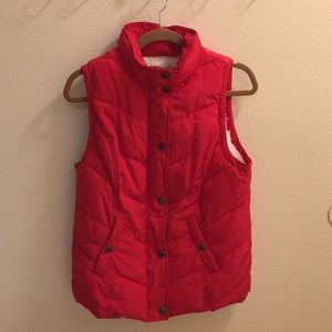 Red Puffy Vest. Fur inside.
